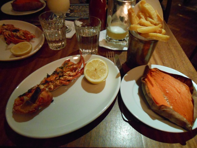 Lobster with garlic butter, Triple Cooked Chips, and Baked Sweet Potatoes